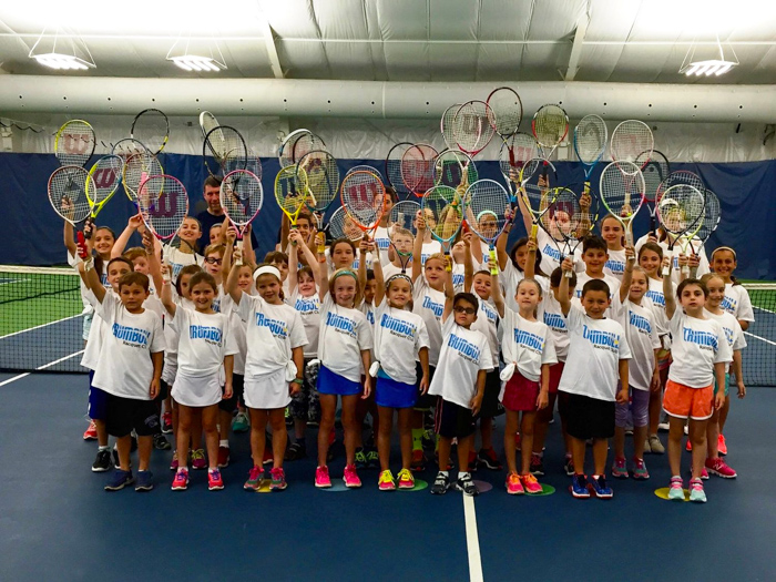 Raise a racket if you're ready for summer tennis camps in Connecticut! Photo courtesy of the Trumbull Racquet Club Summer Camp