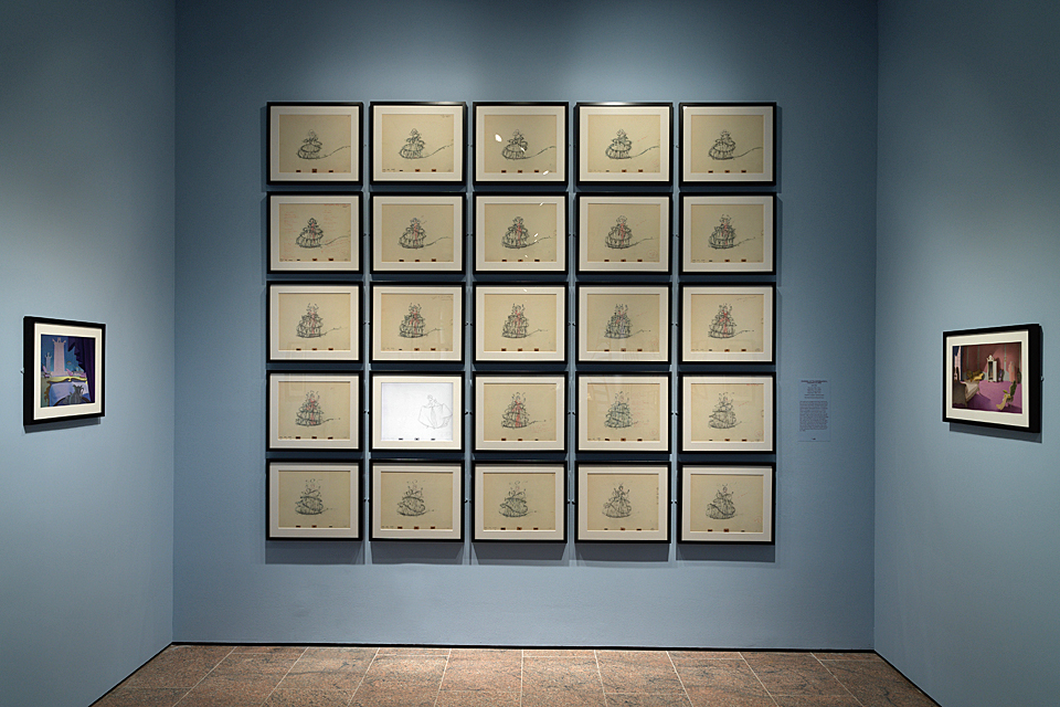 Cinderella sketches hung on a wall in Walt Disney exhibit at The Met